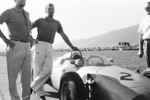Joakim Bonnier next to a Porsche 804