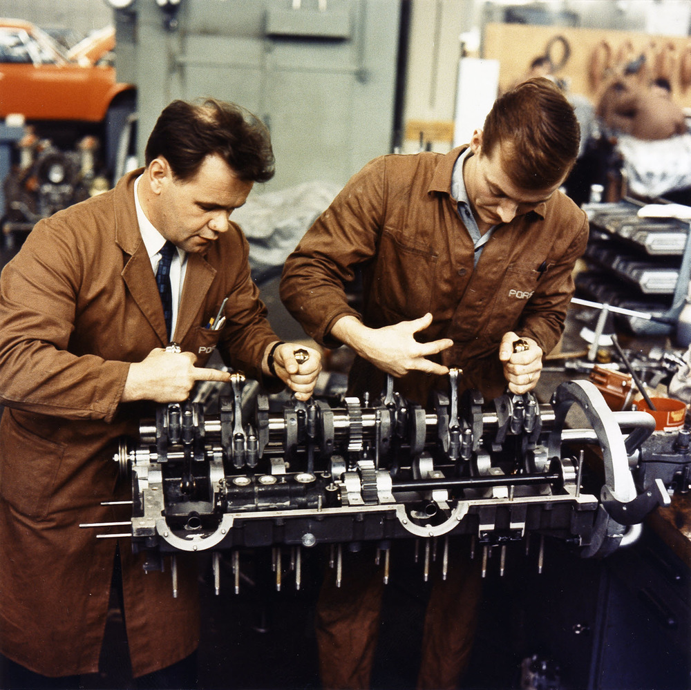 Gerhard Küchle and Valentin Schäffer (left) manufacturing an engine for the Porsche Type 917, 1969/70. Gerhard-Küchle-and-Valentin-Schäffer-left-manufacturing-an-engine-for-the-Porsche-Type-917-196970.